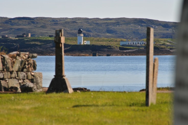 Arnish lighthouse seen through gravestones