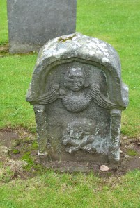 headstone wings skull crossbones 